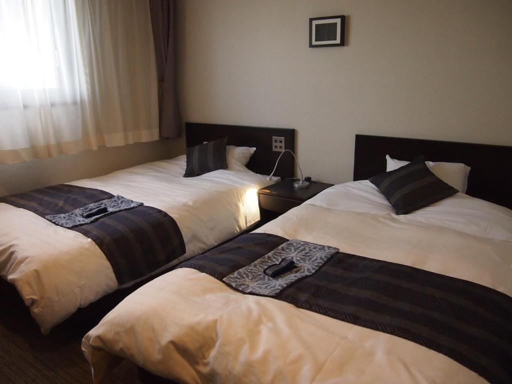 Silk Inn Kagosima Szoba fotó